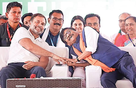 Congress leader Rahul Gandhi with Shiv Sena (UBT) leader Sanjay Raut during ‘Kisan Mahapanchayat’ at Chandwad, in Nashik on Thursday.