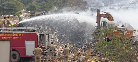 Fire and rescue services personnel trying to douse fire at Brahmapuram plant.