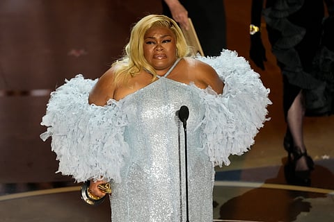 Da'Vine Joy Randolph accepts the award for best performance by an actress in a supporting role for "The Holdovers" during the Oscars on Sunday, March 10, 2024, at the Dolby Theatre in Los Angeles.