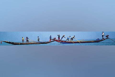 Fishermen at sea.