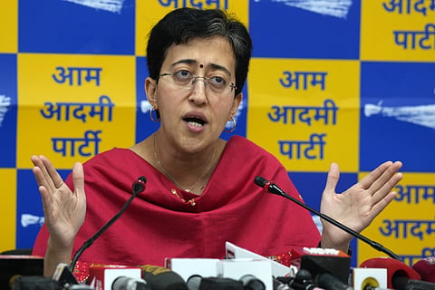 Delhi Education Minister and AAP leader Atishi Singh addresses a press conference, in New Delhi.