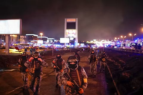 Russian Rosguardia (National Guard) servicemen secured an area at the Crocus City Hall on the western edge of Moscow, Russia, after it was attacked by gunmen.