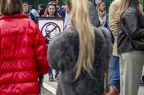 The Russian opposition has called on people to head to polling stations at noon on Sunday in protest as voting takes place on the last day of a presidential election that is all but certain to extend President Vladimir Putin’s rule after he clamped down on dissent.