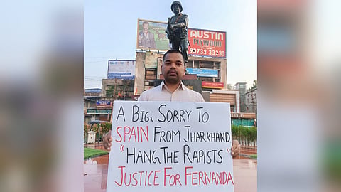 A youth stands in solidarity with the gangrape victim in Ranchi