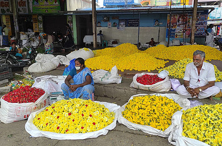 Farmers at the Flower market in the Dharmapuri bus stand.