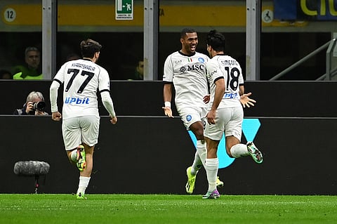 Napoli's Brazilian defender Juan Jesus (C) celebrates with teammates after scoring a goal during the Serie A football match between Inter Milan and Napoli at San Siro stadium in Milan, on March 17, 2024.