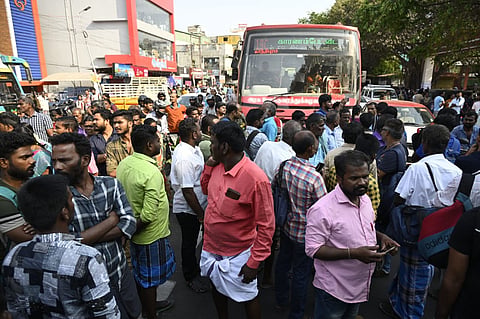A large number of passengers staged a protest in front of the Singanallur bus stand demanding bus services to Madurai and Theni districts on Friday morning.