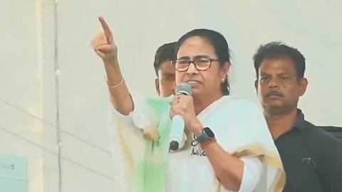 West Bengal Chief Minister and TMC chief Mamata Banerjee addresses an election rally.
