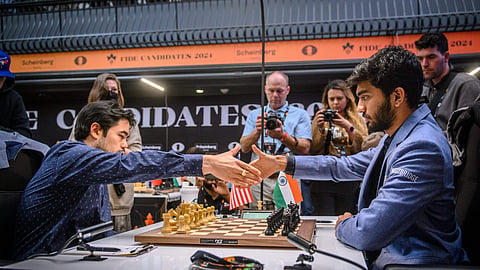 Grandmaster D. Gukesh of India and Grandmaster Hikaru Nakamura of USA during their Round 14 match at the FIDE Candidates 2024 chess tournament, in Toronto, Canada.