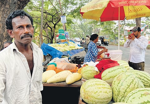 Ashokan before his juice stall at Kundanoor.