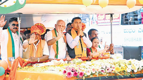 BJP candidate Jagadish Shettar, former CM BS Yediyurappa, Goa CM Pramod Sawant, former minister Balachandra Jarkiholi, sitting MP Mangala Angadi and MLA Abhay Patil take part in the rally in Belagavi on Wednesday