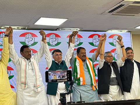Former BJP MP Ajay Nishad with Congress leaders Pawan Khera, Mohan Prakash and Akhilesh Prasad Singh.