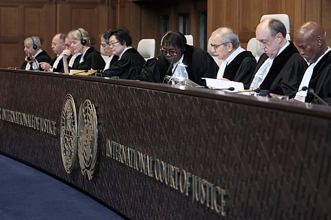 Judge Nawaf Salam, third right, speaks at the start of a two days hearing at the World Court in The Hague, Netherlands, Monday, April 8, 2024, in a case brought by Nicaragua