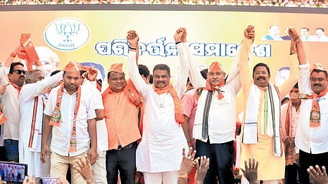 Union Minister Dharmendra Pradhan at a public meeting in Athamallik | express