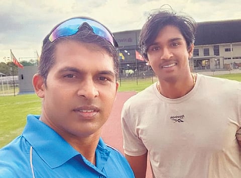 Manu (right) with coach Kashinath Naik