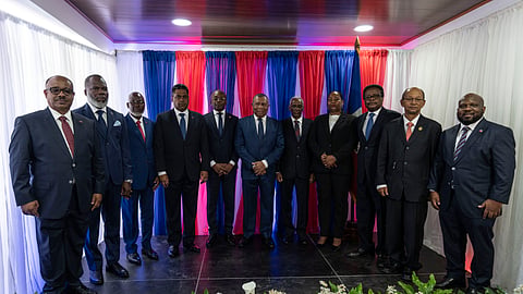 Members of Haiti's transitional council pose for a group photo during an installation ceremony, in Port-au-Prince, Haiti, Thursday, April 25, 2024.