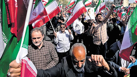 Worshippers chant slogans during an anti-Israeli gathering after Friday prayers in Tehran, Iran, on April 19.