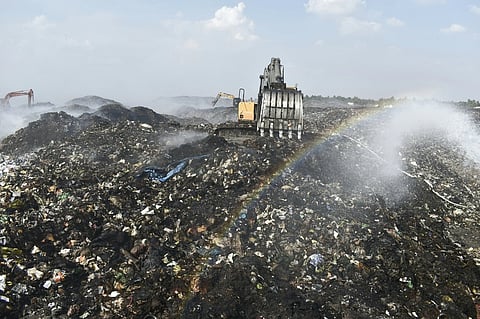 Image of 'Vellalore dumpyard' used for representational purposes only