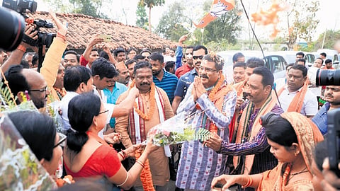 Pradhan greeting his supporters at Kuchinda on Wednesday