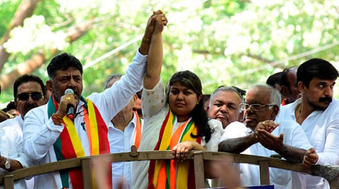 Congress candidate for Bengaluru South Sowmya Reddy arrives in a rally with DCM D K Shivakumar
