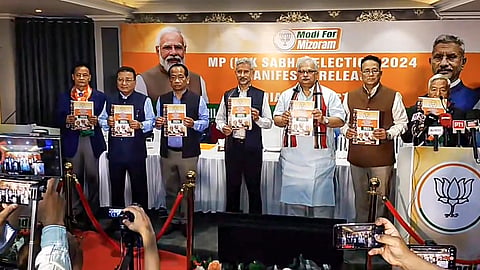 Union External Affairs Minister S Jaishankar with others during the release of BJP Manifesto at Lengpui, in Mamit district.