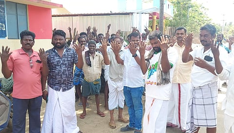 Residents of Panangudi displaying their un-inked fingers on Saturday