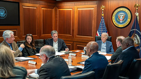President Joe Biden, along with members of his national security team, receive an update on an ongoing airborne attack on Israel from Iran, as they meet in the Situation Room of the White House in Washington, Saturday, April 13, 2024.