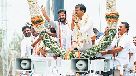 CM A Revanth Reddy greets people during a rally in Mahbubnagar after Congress candidate Vamshi Chand Reddy filed nomination on Friday.