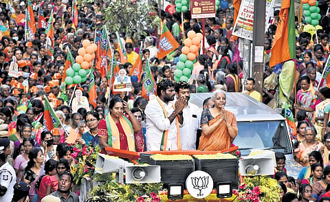 TN BJP chief Annamalai, Finance Minister Nirmala Sitharaman and Coimbatore South MLA Vanathi Srinivasan during a campaign on Saturday