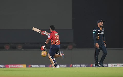 Punjab Kings' Shashank Singh celebrates after winning the Indian Premier League (IPL) 2024 T20 cricket match between Gujarat Titans and Punjab Kings at the Narendra Modi Stadium, in Ahmedabad, Thursday, April 4, 2024.