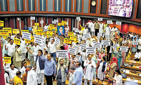 Councillors protest in the House meeting of the Municipal Corporation of Delhi over postponement of mayoral polls on Friday