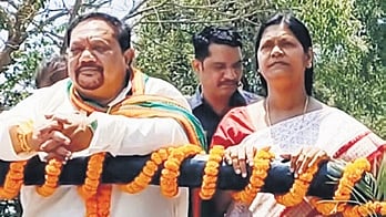 BJD candidate Tukuni Sahu with Singh Bhoi at a rally in Titlagarh