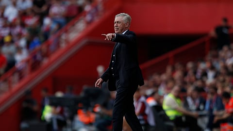 Real Madrid's head coach Carlo Ancelotti gives instructions during a match between Granada FC and Real Madrid at Los Carmanes stadium on May 11, 2024.