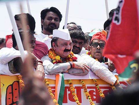 Congress candidate from Amethi constituency Kishori Lal Sharma with other leaders of the INDIA alliance during a roadshow (Photo | Express)