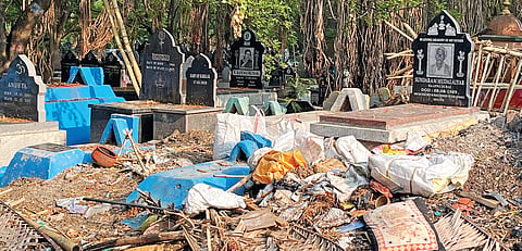 Garlands thrown at Kalpalli burial ground as workers claim they have not been provided with dustbins to discard the waste