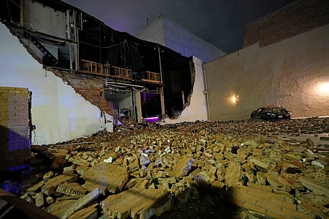 A damaged building is shown in the aftermath of a severe thunderstorm that passed through downtown, Thursday, May 16, 2024, in Houston.