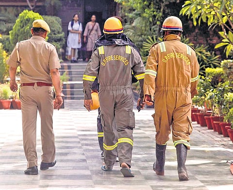Police, fire service personnel arrive at DPS School after a bomb threat in Noida Sector 30