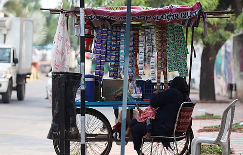 Despite a ban on gutkha and pan masala in the state by the Commissioner of Food Safety, a roadside pushcart is seen
stocked up with banned stuff in Hyderabad on Sunday