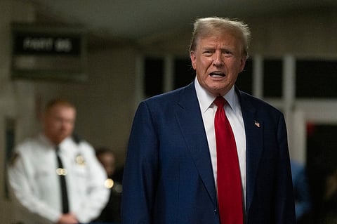 Former President Donald Trump speaks to reporters at Manhattan Criminal Court in New York, Tuesday, April 30, 2024.