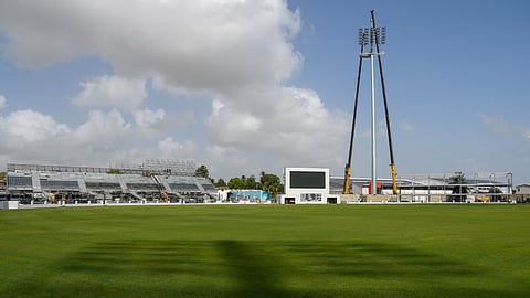 The first newly installed light panel casts a shadow on the playing field in preparation for the ICC Men's T20 Cricket World Cup at Kensington Oval, Bridgetown, Barbados, on April 20, 2024.