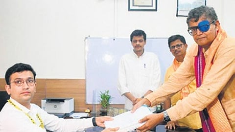 BJP’s Baijayant and Manmohan submitting their papers and Niranjan filing his nomination on Friday