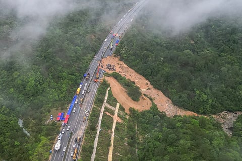 This photo taken on May 1, 2024 shows an aerial view of a collapsed section of a highway near Meizhou, in southern China’s Guangdong province.