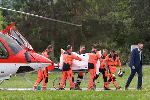 Rescue workers wheel Slovak Prime Minister Robert Fico, who was shot and injured, to a hospital in the town of Banska Bystrica, central Slovakia, Wednesday, May 15, 2024.
