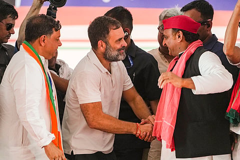 Congress leader Rahul Gandhi with Samajwadi Party (SP) chief Akhilesh Yadav and Congress candidate from Kanpur constituency Alok Misra during an election rally for the Lok Sabha polls, in Kanpur.
