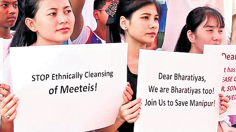 Members of Karnataka Meitei Association held a global solidarity campaign in Bengaluru as a part of one year of Manipur crises at Freedom park on Friday