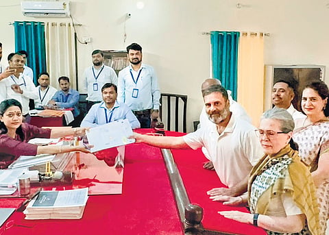 Congress leader Rahul Gandhi files his nomination papers for the Lok Sabha elections in Rae Bareli on Friday, as mother Sonia and sister Priyanka look on (File photo | PTI)