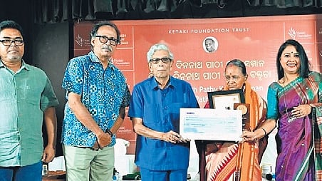 Dinanath Pathy Kala Samman being received by a family member of Binod Maharana