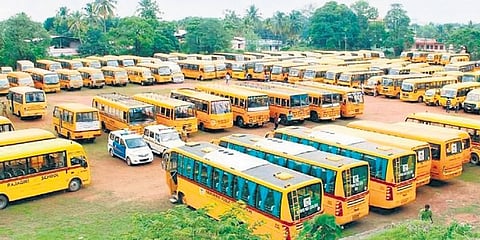 An aerial view of school and college buses waiting for the vehicle test