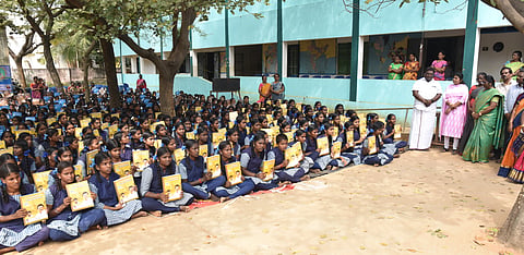 Minister Sivasankar overseeing distribution of study material in Kunnam