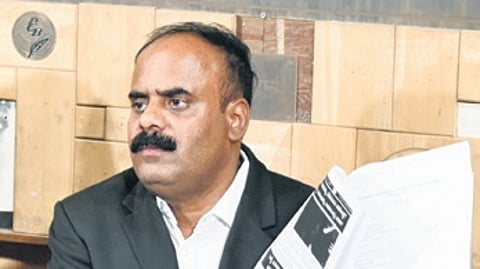 Advocate and BJP leader Devaraje Gowda addresses a press meet in Bengaluru on Monday